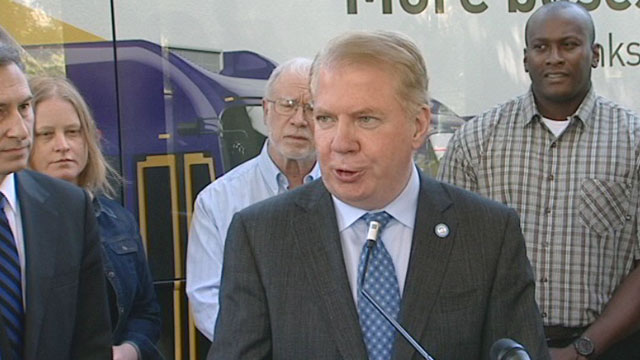 City officials mark expansion of Metro service in Seattle 6/17/15