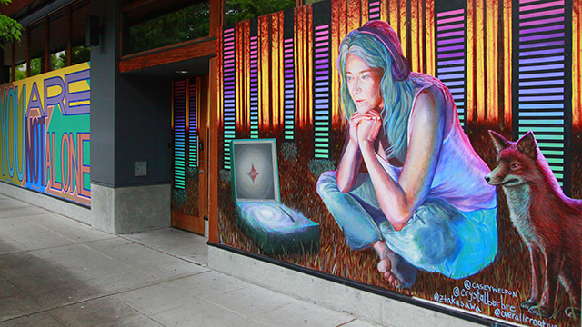 Murals on boarded-up business brighten neighborhoods during pandemic
